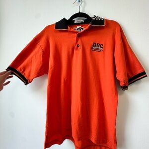 Vintage Orange Polo Shirt with Striped Collar and Cuffs